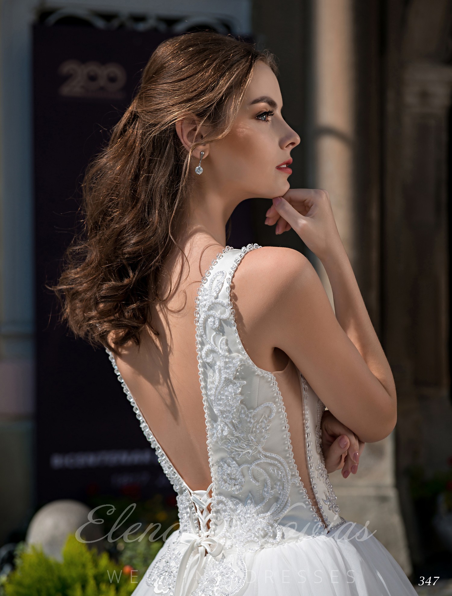 Wedding dress with open back and deep neckline